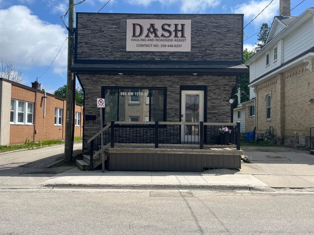 Dash Hauling and Roadside Assist storefront sign